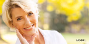 Older Female Patient Considering Dental Implants 300x150