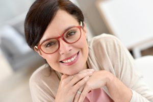 woman smiling because of bone grafts