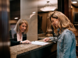 Receptionist with a patient